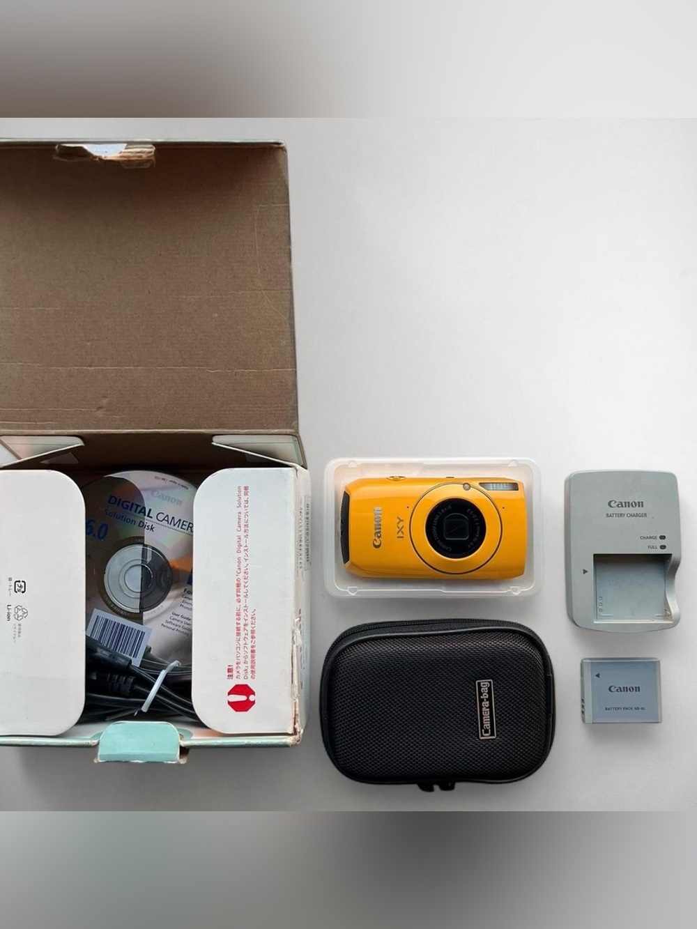 rare New w Box Canon IXY 30S matte yellow camera w Battery, Case, Charger includ